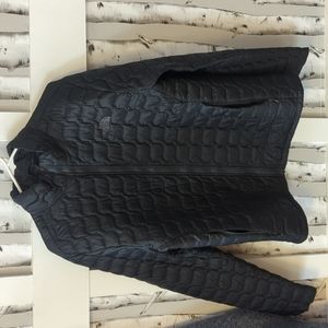 North Face Thermoball puffy Jacket. There is a small tear, see the picture.